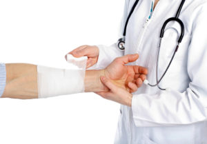 medical malpractice lawyer Arlington, TX Doctor Bandaging Arm